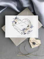 Imán Hexágono Plexi de corazón geométrico con espejo dorado y reserva de fecha floral azul acero